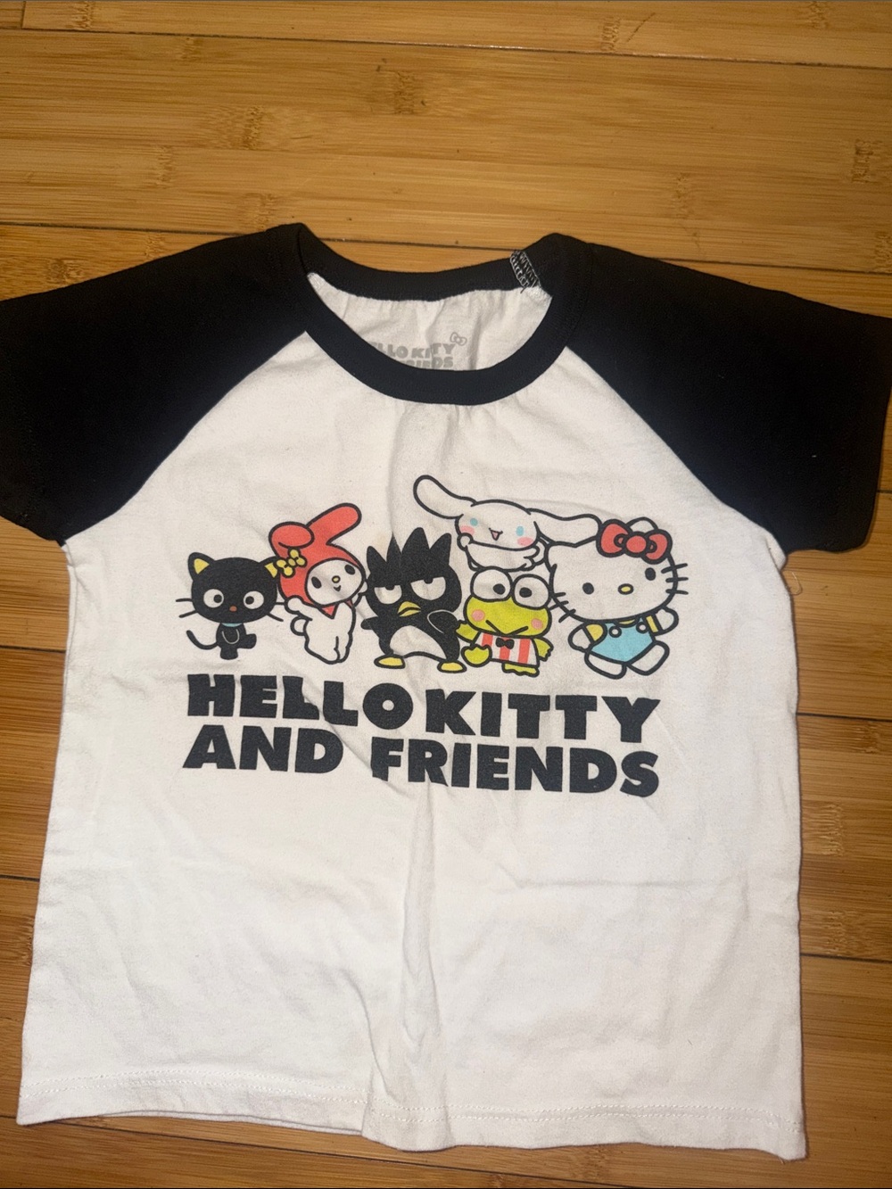 Hello Kitty Black & White Raglan Tee with Character Print